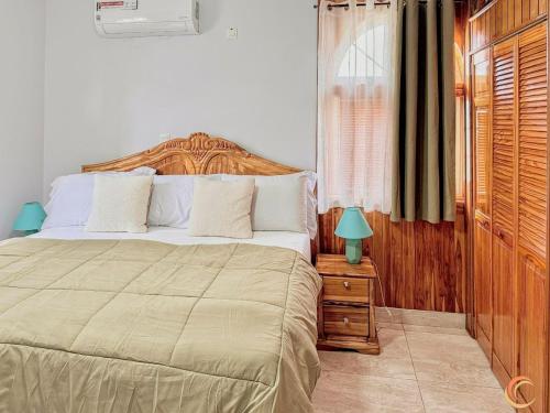 Katil atau katil-katil dalam bilik di JezHos - Dina Fully Furnished Apartment