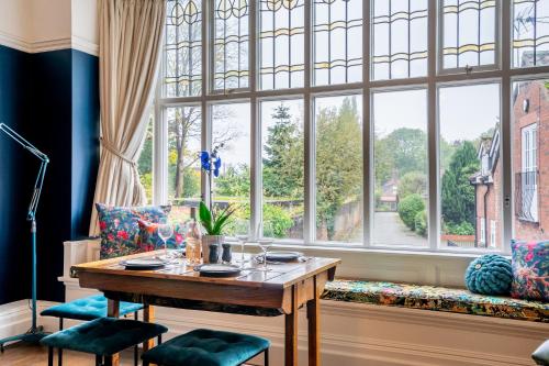a room with a table and a large window at 7 Arndale Court in York