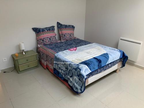 Postel nebo postele na pokoji v ubytování Agréable appartement 2 pièces