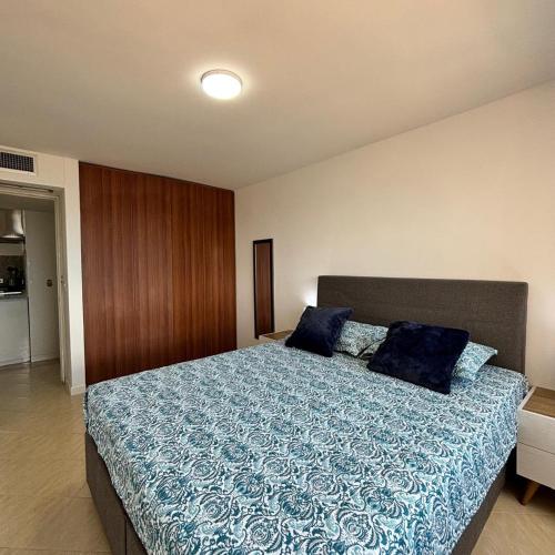 Ένα ή περισσότερα κρεβάτια σε δωμάτιο στο Residencias Atlantic Margarita