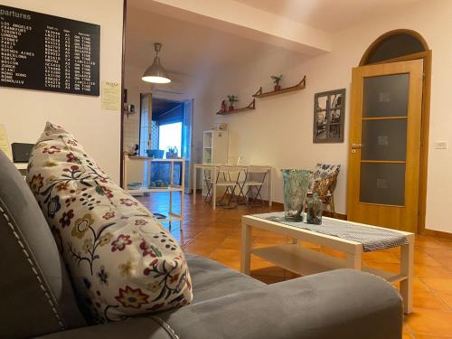 a living room with a couch and a table at Da Ste in Ercolano