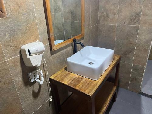 Ein Badezimmer in der Unterkunft Coco Bungalows
