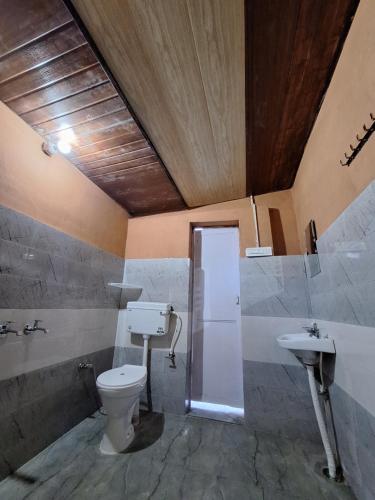 Koupelna v ubytování TATHASTU Bir -Homestay ,DORM,HOSTEL