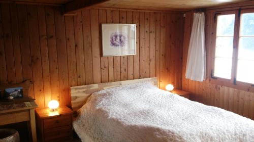 Postel nebo postele na pokoji v ubytování Breitmoos