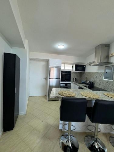Η κουζίνα ή μικρή κουζίνα στο Residencias Atlantic Margarita