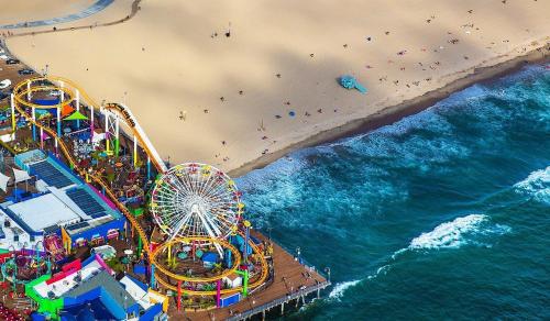 an overhead view of a beach with a roller coaster at 15 City View Santa Monica in Los Angeles