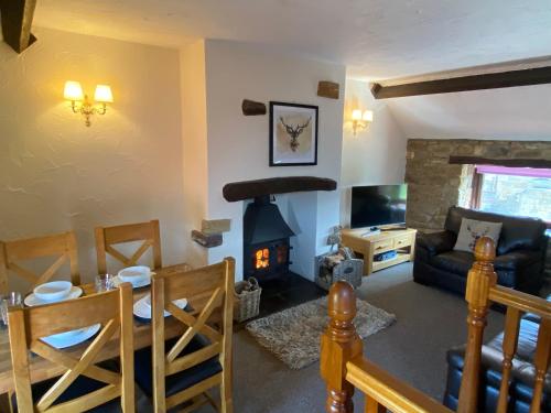 Ruang duduk di Craven Garth Cottages