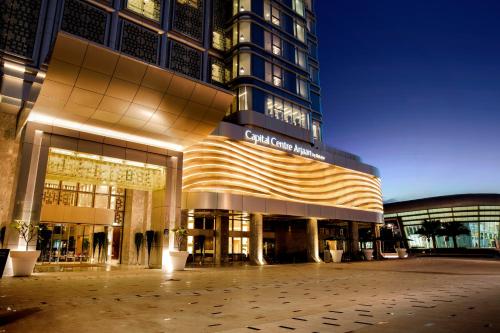 a large building with a large at Capital Centre Arjaan by Rotana in Abu Dhabi