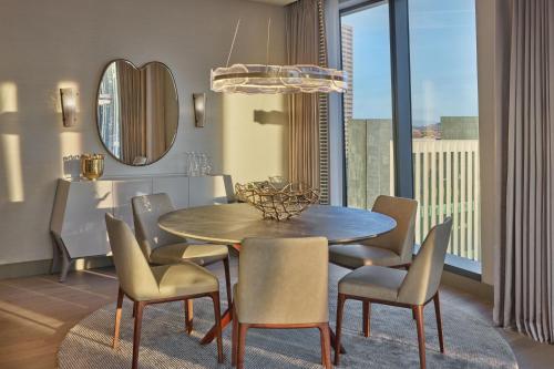a dining room with a table and chairs at The Ritz-Carlton, Portland in Portland