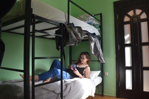 Harmony Backpackers Hostelにあるベッド