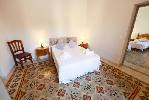 Postel nebo postele na pokoji v ubytování Casa Rural Teralba