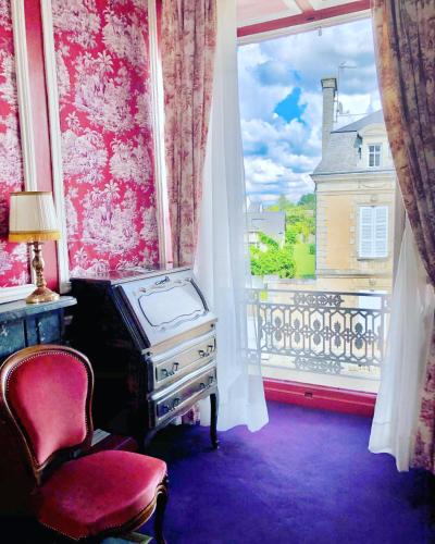 Ένα ή περισσότερα κρεβάτια σε δωμάτιο στο L'Hotel de Hercé Chambre d'Hote