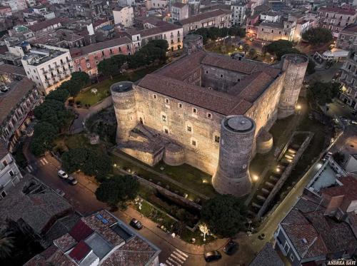 an aerial view of a building with a tower at B&B Domus Pina in Catania