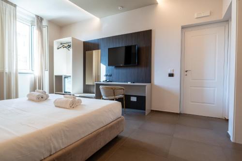 Postel nebo postele na pokoji v ubytování Hotel Diamond