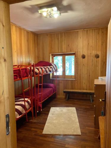 Postel nebo postele na pokoji v ubytování Villa Malgary
