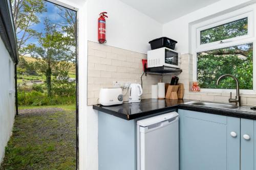Kuchyň nebo kuchyňský kout v ubytování Cottage 194 - Leenane