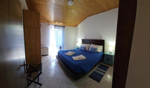 Postel nebo postele na pokoji v ubytování Podere Scoldasu - Nettuno