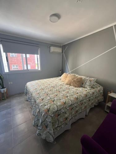 Postel nebo postele na pokoji v ubytování Apart Uruguay