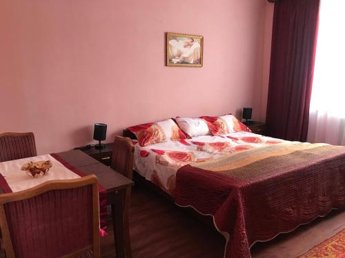 Postel nebo postele na pokoji v ubytování Гостевой дом