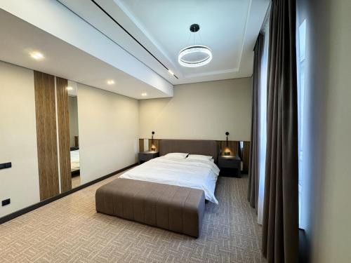 Postel nebo postele na pokoji v ubytování Residence Hotel Spa