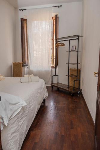 Ένα ή περισσότερα κρεβάτια σε δωμάτιο στο Otto Apartment Montecatini