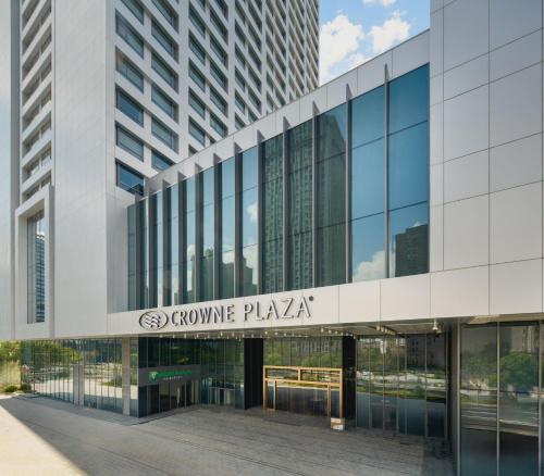 an office building with a sign that reads geonne plaza at Crowne Plaza Kunshan East by IHG in Kunshan