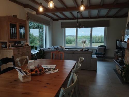 Posezení v ubytování Vakantiehuis 't Leideveld