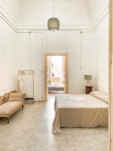 Postel nebo postele na pokoji v ubytování Palazzo Giustiniani L'Ambasciatore