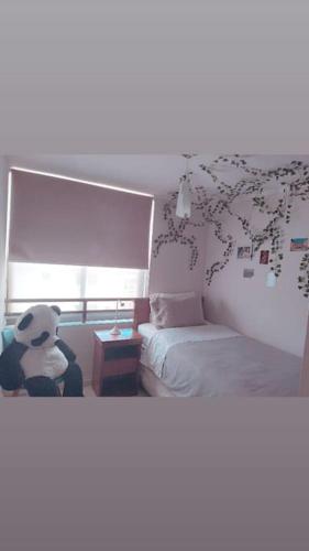 Ein Bett oder Betten in einem Zimmer der Unterkunft Hermoso depto Concón primera línea 3 dormitorios