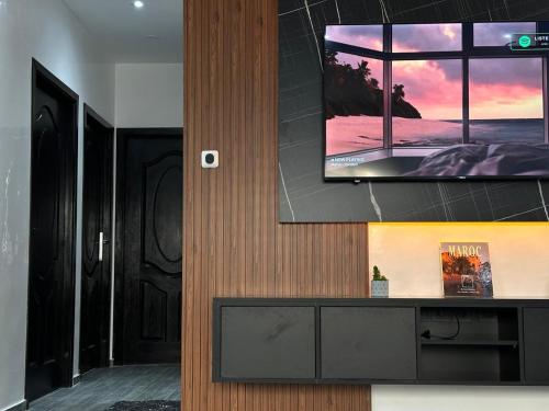 Μια τηλεόραση ή/και κέντρο ψυχαγωγίας στο Appartement Moderne & Cosy