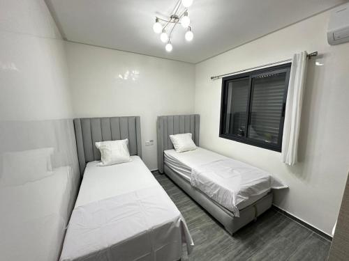 Ένα ή περισσότερα κρεβάτια σε δωμάτιο στο Appartement Moderne & Cosy