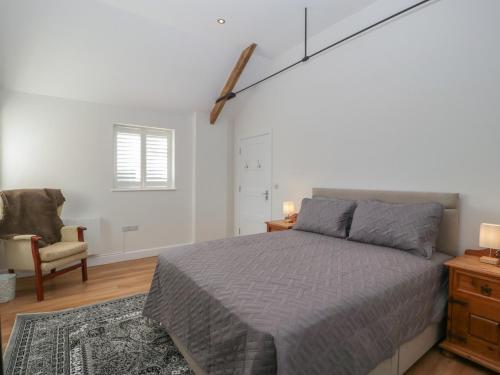 Postel nebo postele na pokoji v ubytování Singletree Cottage