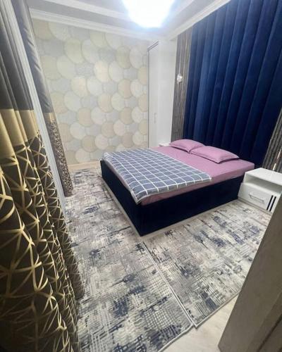 Ένα ή περισσότερα κρεβάτια σε δωμάτιο στο Manzara house
