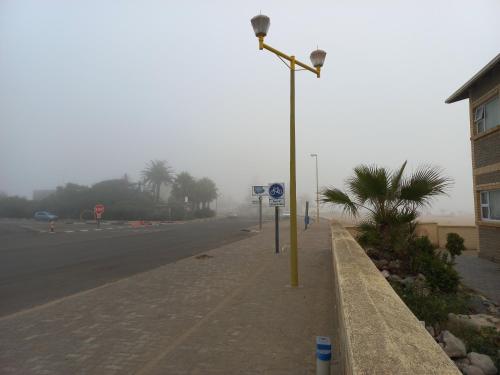 a street light on the side of a road at Huisie Langs Die See in Swakopmund