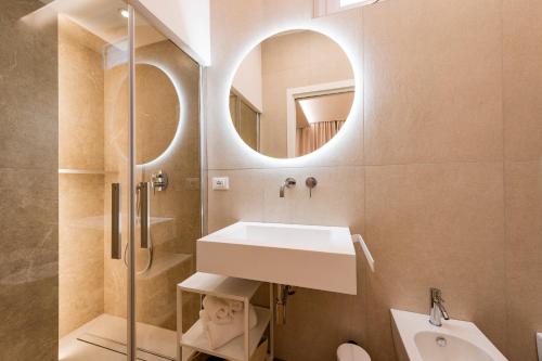 a bathroom with a sink and a mirror at Affittacamere La Nuvola in Chieti