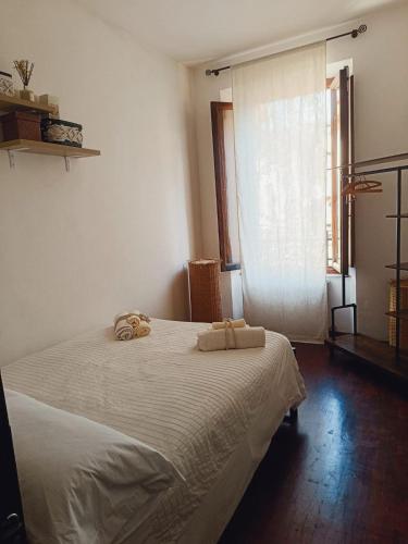 Ένα ή περισσότερα κρεβάτια σε δωμάτιο στο Otto Apartment Montecatini