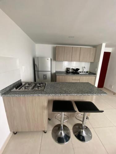 Kuchyň nebo kuchyňský kout v ubytování Apartamento , frente a la universidad autónoma , edificio urban