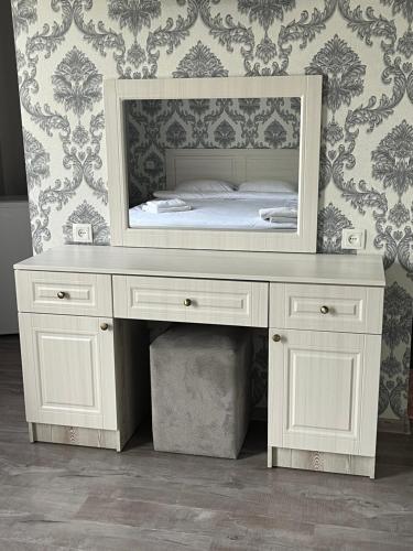 a dressing table with a mirror on top of it at NAREMA FAMILY HOTEL Meghri in Meghri