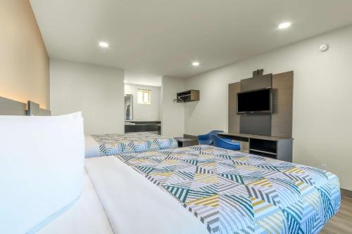 Ένα ή περισσότερα κρεβάτια σε δωμάτιο στο Motel 6-Willows, CA