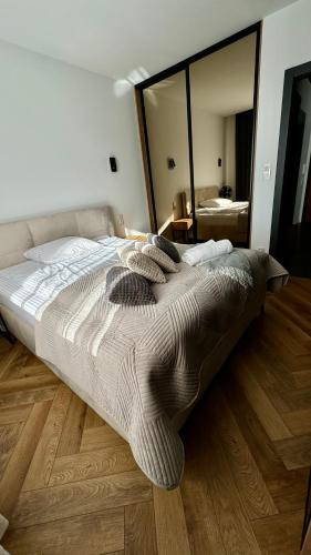 Ένα ή περισσότερα κρεβάτια σε δωμάτιο στο Forum Apartment