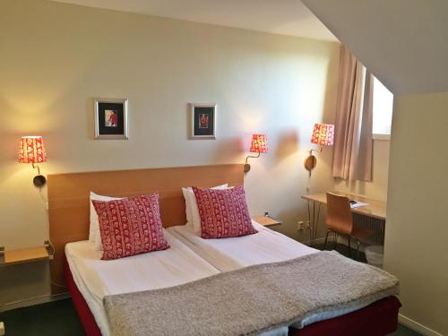 Postel nebo postele na pokoji v ubytování Mora Hotell & Spa