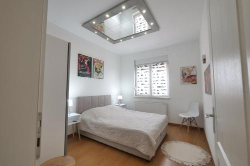 Postel nebo postele na pokoji v ubytování Apartman Marija