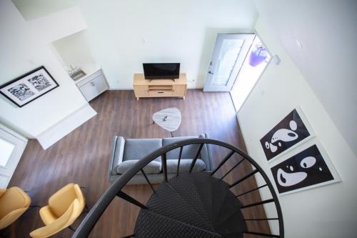 an overhead view of a room with a chair and a desk at Onyx Hotels in Austin