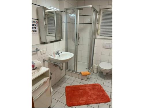 Ένα μπάνιο στο Am Wiiwegli Comfortable holiday residence