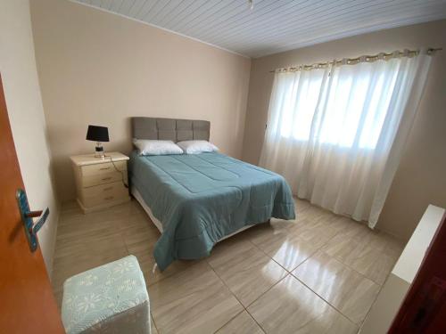 Postel nebo postele na pokoji v ubytování Pousada Santiago AP-01