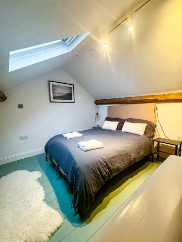 Ένα ή περισσότερα κρεβάτια σε δωμάτιο στο North Wales Cottage Views, Walks, Dogs Welcome