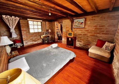 Posezení v ubytování Cabaña en el Campo Malchinguí WIFI 24 horas