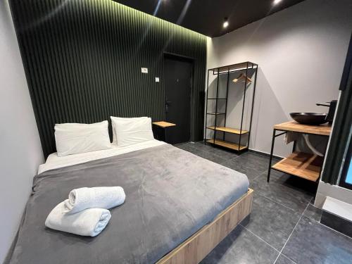 Katil atau katil-katil dalam bilik di Mickitos Square Rooms and Apartments