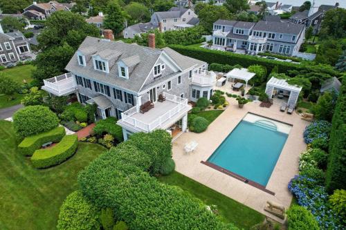 an aerial view of a house with a swimming pool at Luxurious Estate Private Heated pool in Harwich