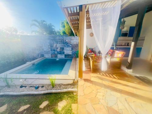 Bazén v ubytování Zandoli piscine, vue mer, paisible, jardin nebo v jeho okolí